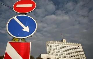 Капитал - С России предложили снимать санкции поэтапно