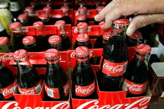 Капитал - Coca-Cola впервые начнет производить алкогольные напитки