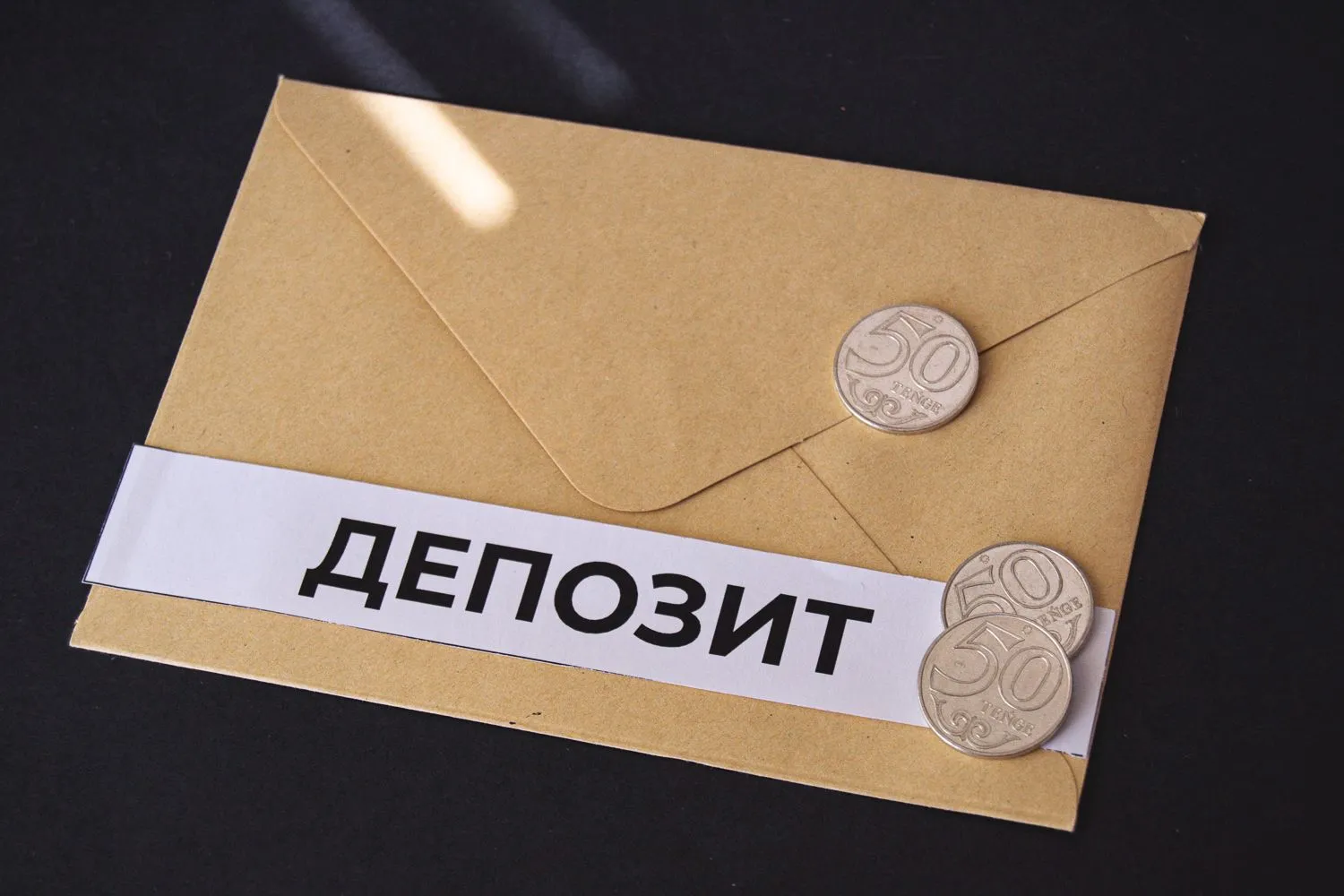 В марте объем депозитов в тенге снизился до 31,1 млрд тенге