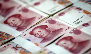 Капитал - ​Девальвация юаня не повлияла на переход к плавающему тенге