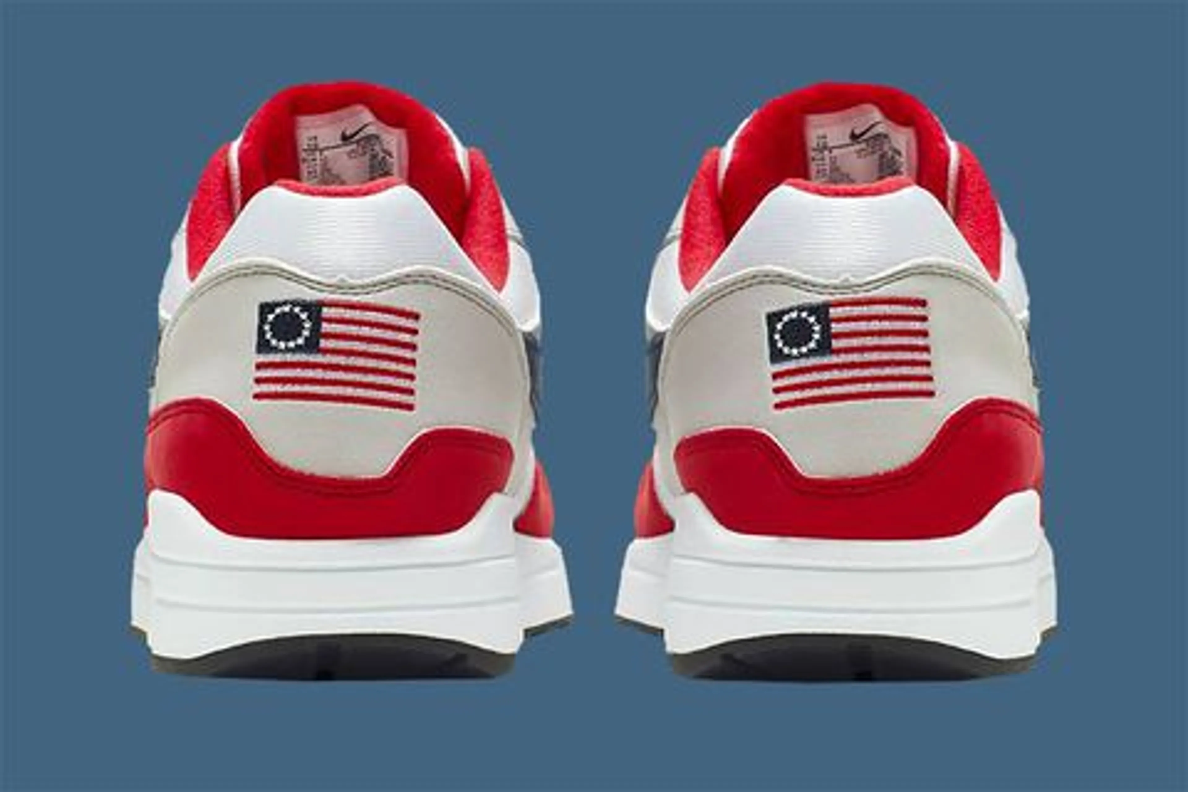 Капитал - Nike прекратил продажу кроссовок с первым флагом США