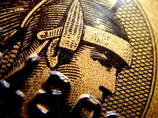 Капитал - Чистая прибыль American Express выросла на 2%