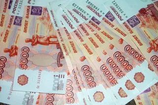 Капитал - Россия все еще планирует сделать рубль международным