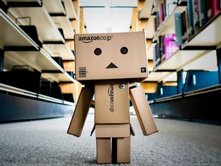 Капитал - Amazon начал менять управляющий персонал на роботов