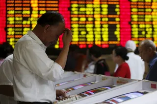 Капитал - В Китае остановили торги акциями после обвала на бирже