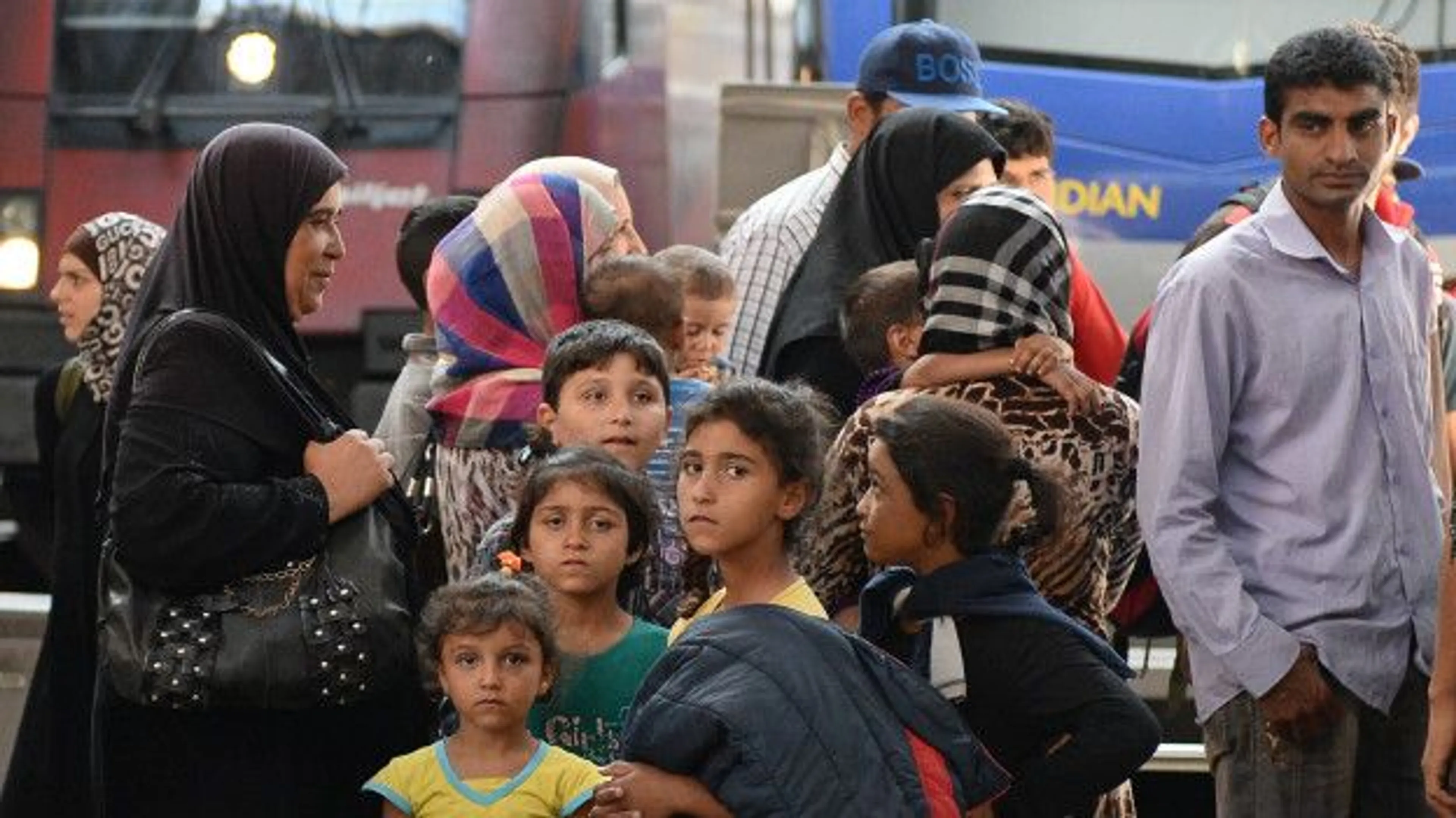 Капитал - Германия примет меры, чтобы справиться с притоком мигрантов