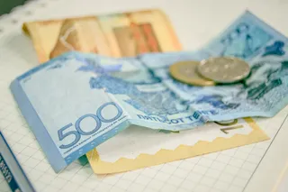 Капитал - Максимальный курс в обменниках — 391 тенге за доллар