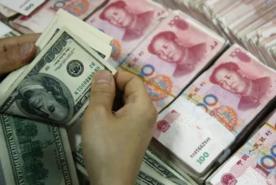 Юань показал наибольший дневной рост за десять лет