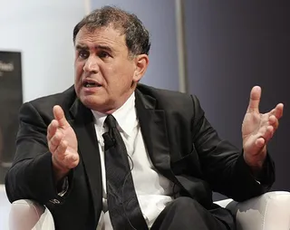 Капитал - По прогнозам Рубини золото подешевеет до $1000