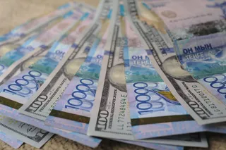 Капитал - Тенге укрепился в начале торгов на KASE