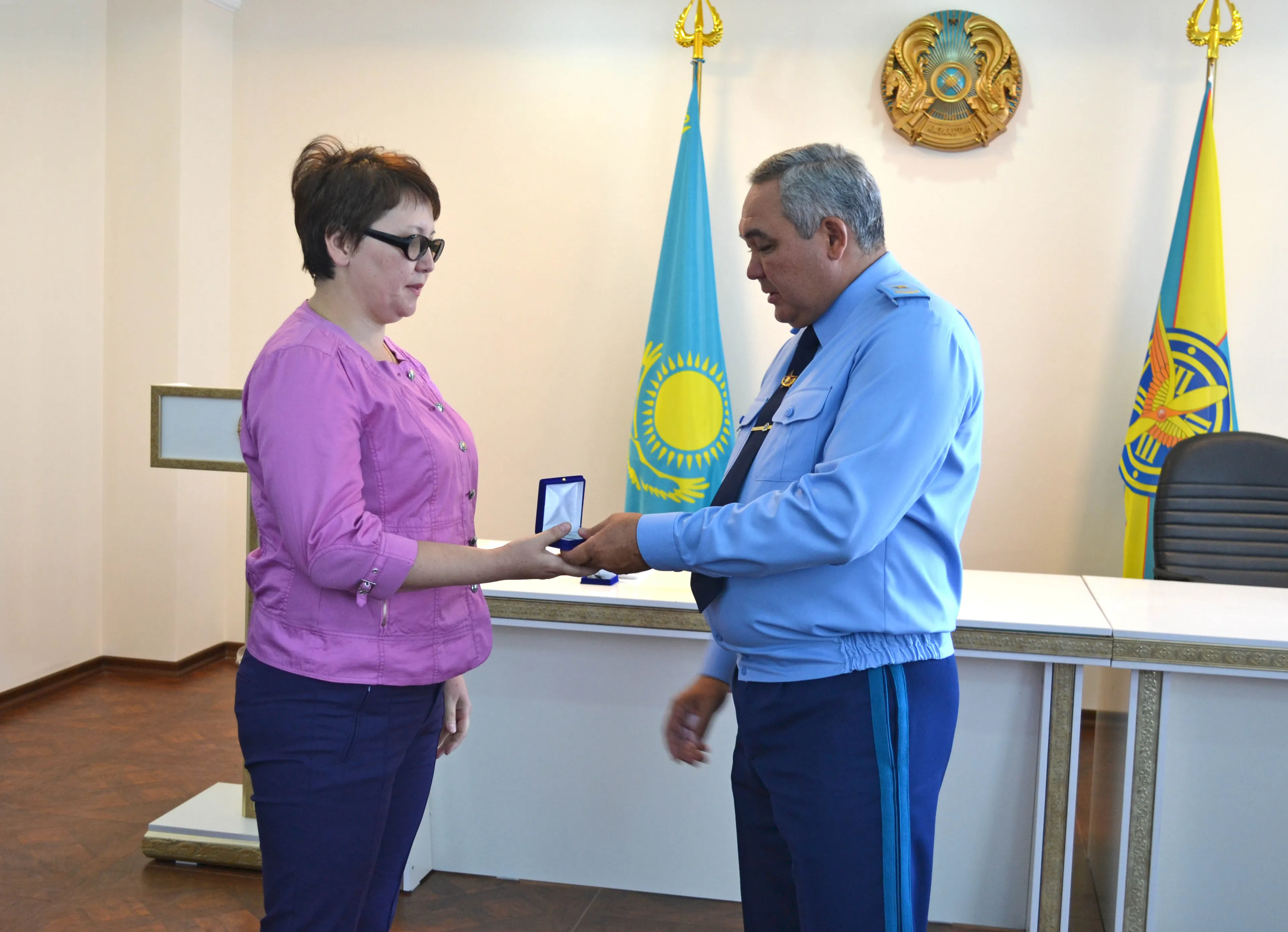 Капитал - Семья погибшего летчика получила квартиру в Астане