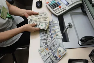 Капитал - Объем торгов по доллару вырос до $195 млн