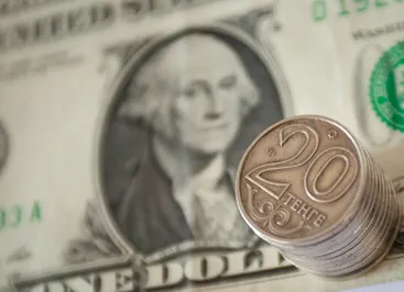 Доллар держится возле отметки 322 тенге