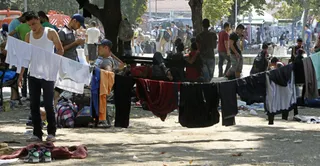 Капитал - В Мюнхене построят стену около приюта для беженцев