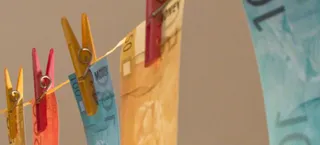 Капитал - ЕС исключит из черного списка налоговых гаваней ОАЭ и Швейцарию